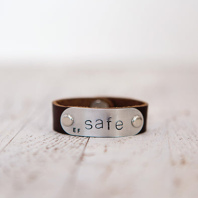 safe band stamped safe